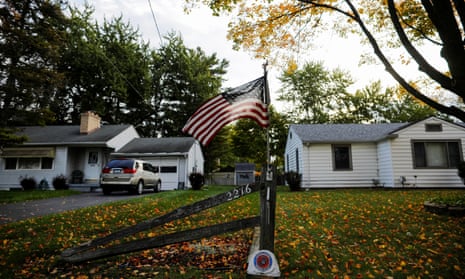 an American flag in a person yard