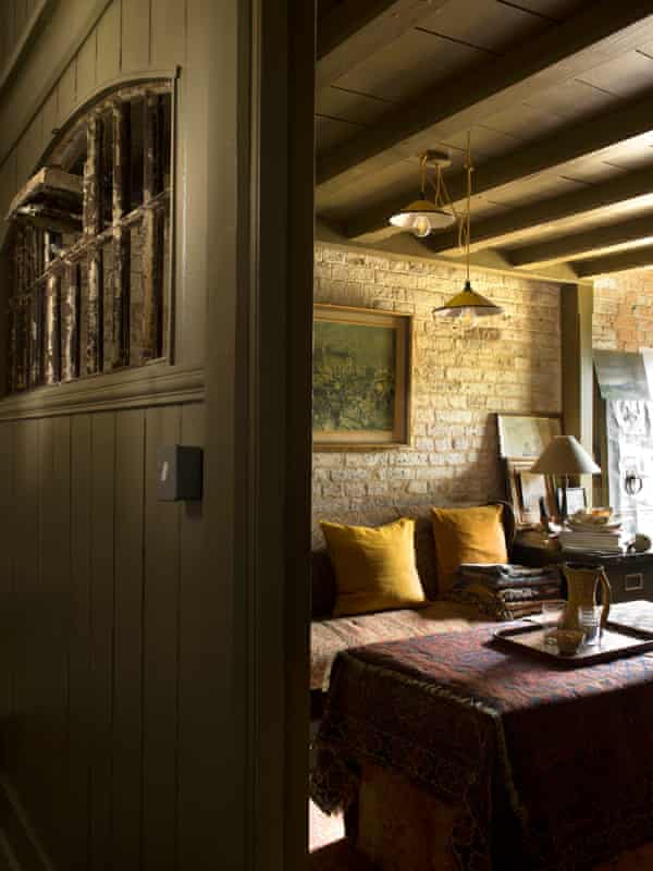 ‘Dark, embracing and all natural’: an old prison door and reclaimed bricks and timbers in the snug.