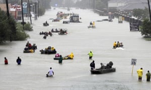 Floodwaters brought on by tropical storm Harvey in Houston on 28 August 2017. Scientists say climate change has caused more rain in hurricanes Harvey, Maria, Katrina and others.