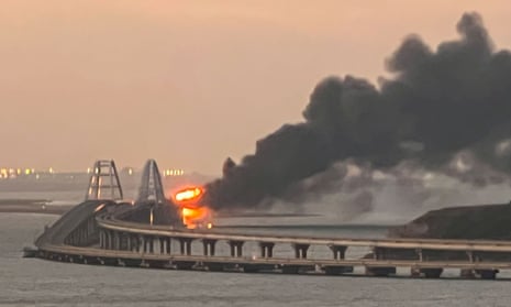 Fire on the Kerch bridge linking Crimea to Russia after the huge explosion early on Saturday.