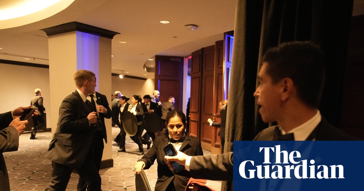 Chaos as Trump whisked from Washington press dinner after shots fired – in pictures