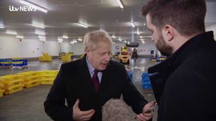 Boris Johnson being questioned over the picture of the ill child sleeping on the floor of Leeds hospital by an ITV journalist.