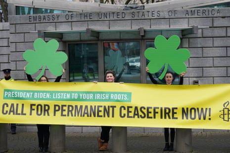 Amnesty International activists demonstrate outside the US embassy in Dublin on Friday urging president Joe Biden to call for a permanent ceasefire in Gaza. The protesters are holding a yellow banner that reads: ‘President Biden: listen to your Irish roots. Call for permanent ceasefire now!’.