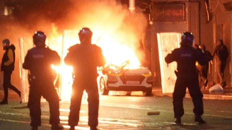 Violent protests break out across central Dublin after stabbing attack at school – video