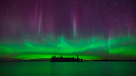 The northern lights above an island at Voyageurs national park, Minnesota