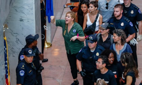 Protests against on Supreme Court nominee Judge Brett Kavanaugh<br>epa07070220 US comedian Amy Schumer gestures after getting detained along with hundreds of other protestors against the confirmation of Supreme Court nominee Judge Brett Kavanaugh at the Hart Senate Office Building in Washington, DC, USA, 04 October 2018.  EPA/ERIK S. LESSER