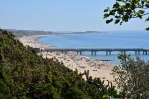 Boscombe beach in Bournemouth, Dorset, fills up with families enjoying the half-term heat