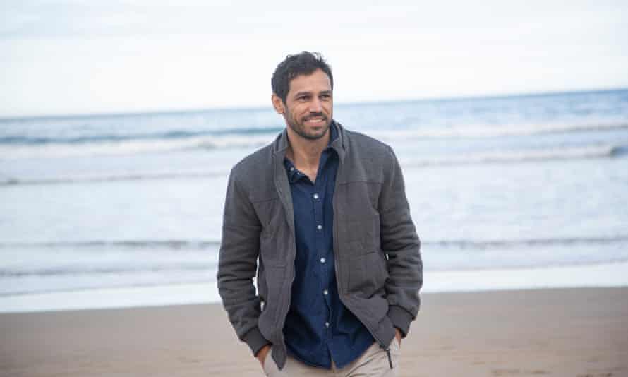 Michael Raymond on a beach