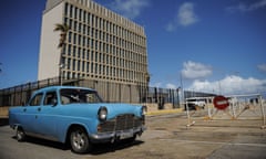 A blue car parked near the US embassy in Havana
