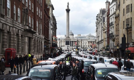 Black cab fill the streets around Trafalgar Square