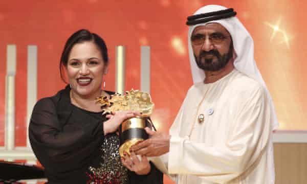 Zafirakou accepting the award in Dubai from the city’s ruler, Sheikh Mohammed bin Rashid al Maktoum.