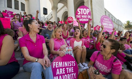 Activists chant as they rally in support of Planned Parenthood in Los Angeles. CPCs are sometimes located close to Planned Parenthood locations.