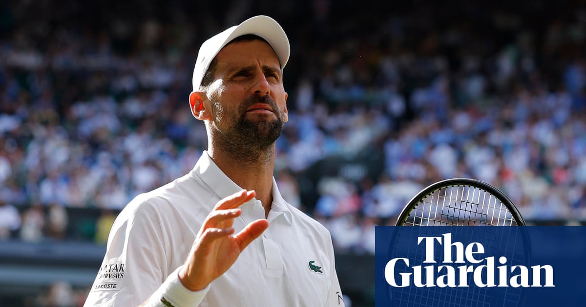 Novak Djokovic acknowledges the Wimbledon crowd after his semi-final defeat