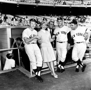 Actors Doris Day and Cary Grant pose with New York Yankees players, Mickey Mantle, Roger Maris and Yogi Berra