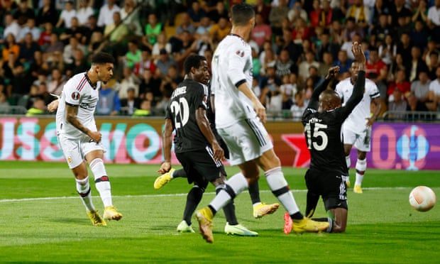 Jadon Sancho scores