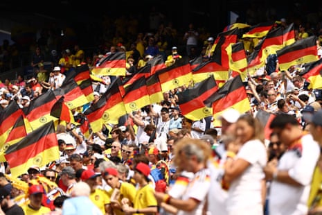 Fans with waves of Germany flags