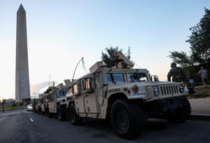 US Army National Guard Humvees park near the Washington Monument.