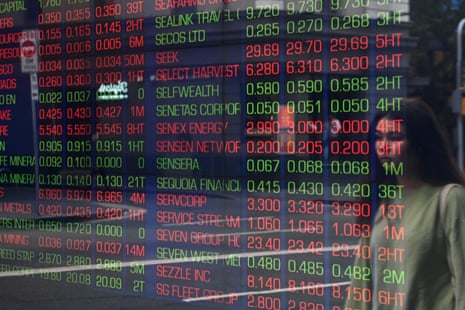 Digital market boards are seen at the Australian Securities Exchange (ASX).