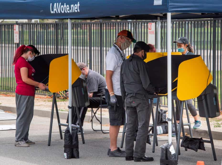 People vote at an early voting station for the special congressional election in Lancaster, California on 10 May 2020. 