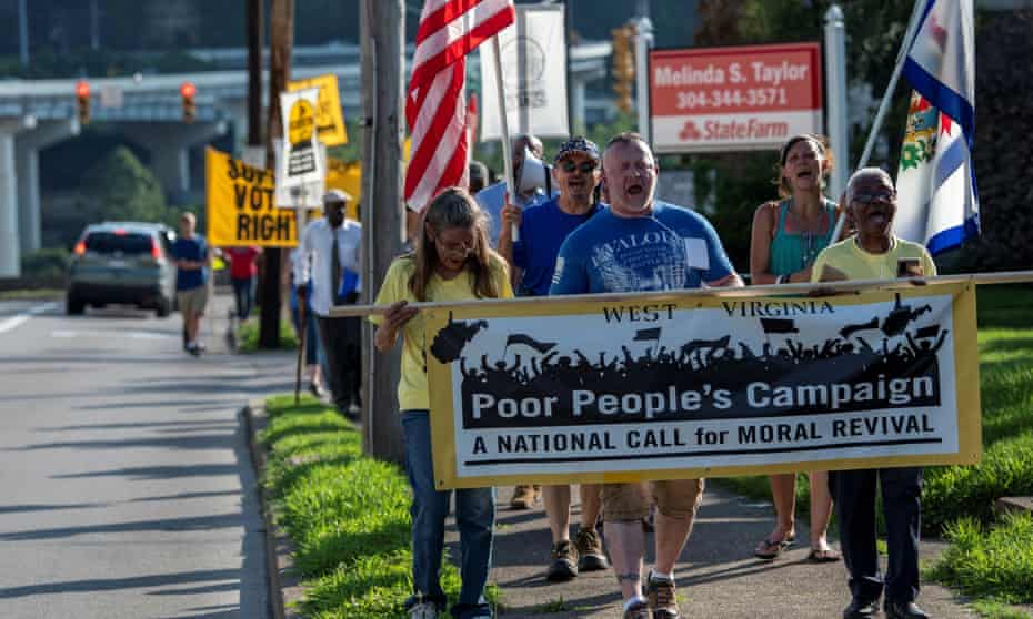 The Poor People’s Campaign and local residents take part in the ‘Moral March on Manchin’ earlier this week.