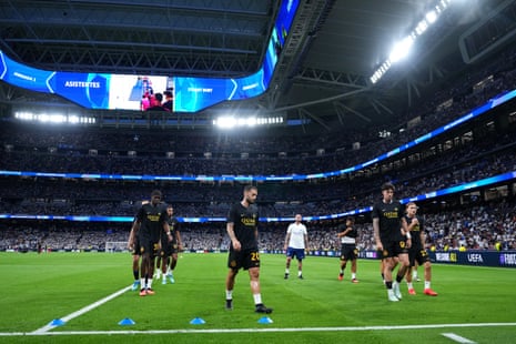 General view inside the Bernabéu as the Inter players warm up.