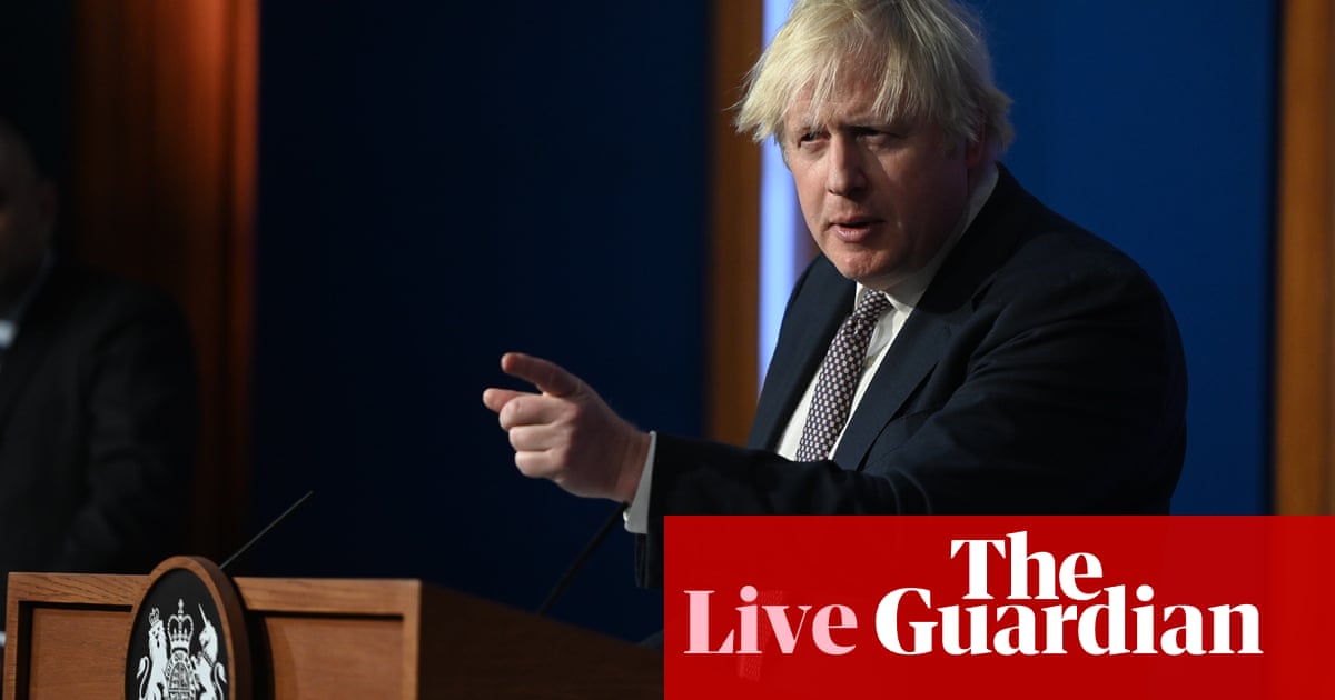 UK Covid live: Boris Johnson to hold press conference as spokesperson quits and Omicron fears grip country