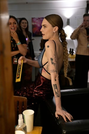 Cara Delevingne in the backstage preparation area before going on stage to present an award