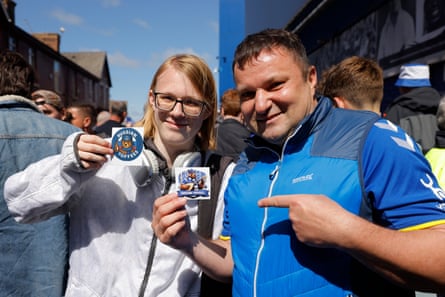 Andrey Seleznev (right) with his son Roman, who live in Krasnodar, Russia, pose with Russian Toffees stickers on Goodison Road