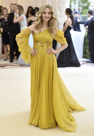 Arguably the golden era for the Catholic church, the Renaissance provided ample inspiration for actor Amanda Seyfried’s golden Prada gown, H.Stern tiara and wavy locks. 