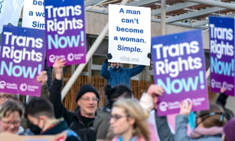 Supporters and opponents of Scotland’s gender recognition reform bill demonstrate outside the Scottish parliament on Tuesday.