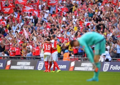 Arsenal players celebrate.