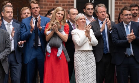 Nadine Dorries applauding Boris Johnson alongside his wife, Carrie, and their daughter, Romy, after he read his resignation statement outside 10 Downing Street.