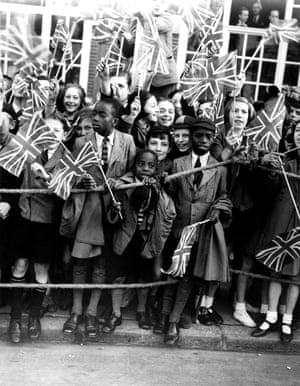 Crowds of children cheering Queen Mary, October 1938 Queen Mary as she opened a new extension to Lambeth Town Hall, Brixton, London, between the wars.