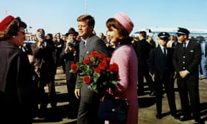 John F Kennedy and Jacqueline Bouvier Kennedy arrive at Love Field in Dallas, Texas less than an hour before his assassination on 22 November 1963.