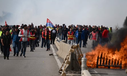 Oil workers outside a refinery in protest after the government announced the first requisition of oil workers since the beginning of the strikes against the pension reform, at the Fos-sur-Mer depot near Marseille