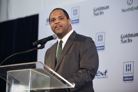 a man speaks into a microphone