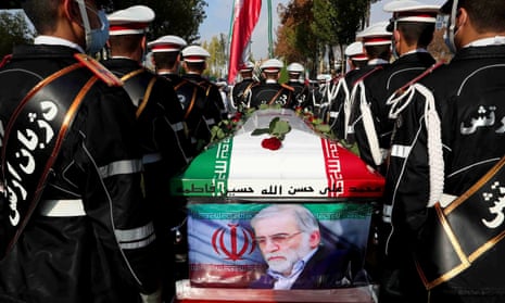 Members of Iranian forces carrying the coffin of Iranian nuclear scientist Mohsen Fakhrizadeh during a funeral ceremony in Tehran on Monday