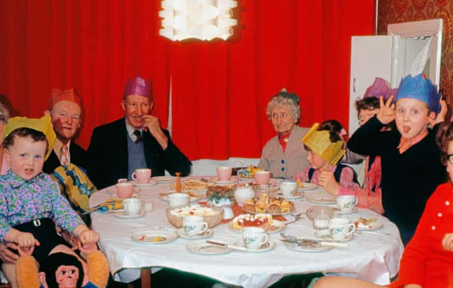 1970 s shot of family having christmas party meal at home