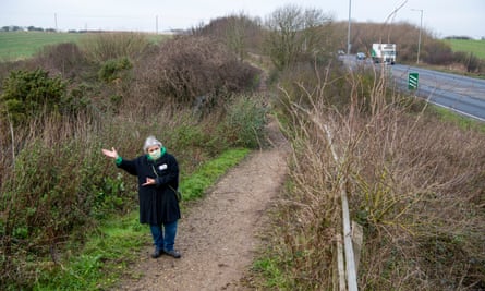 Sarah Gleave pointing to the planned lorry park.