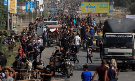 Palestinians in central Gaza as they head south from Gaza City on Friday