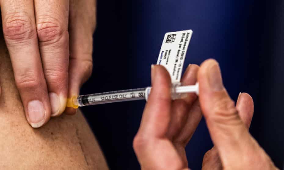 Nurse administers the AstraZeneca vaccine