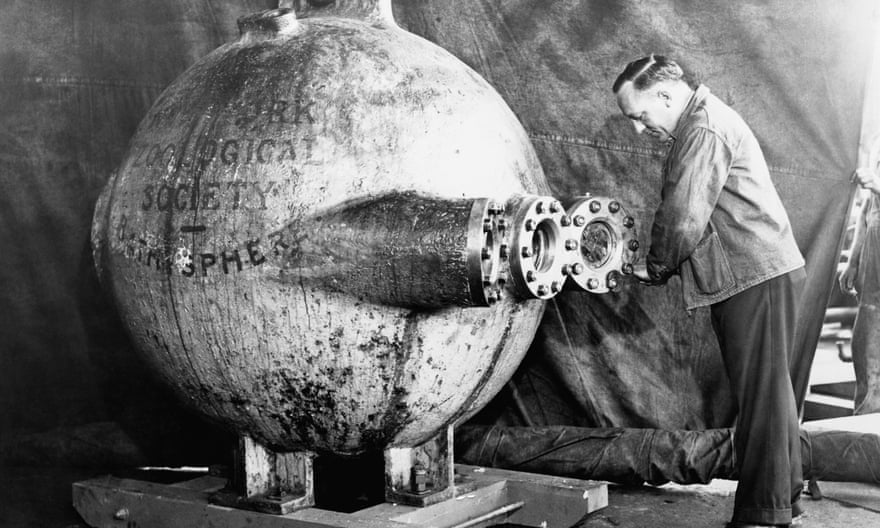 Dr William Beebe with a bathysphere.