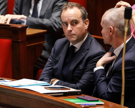 Prime minister Sebastien Lecornu sits at a desk during a government questions session in parliament