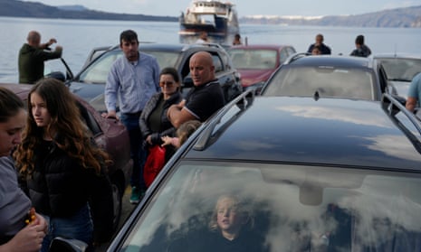 People wait for the arrival of a regularly scheduled ferry to Athens’ port of Piraeus, after a spike in seismic activity raised concerns about a potentially powerful earthquake in Santorini earlier this week.