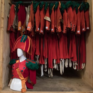 Red military coats at the Opera Australia costume and prop sale