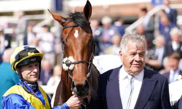 Desert Crown, jockey Richard Kingscote and trainer  Sir Michael Stoute after the colt’s victory at York.