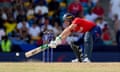 Jos Buttler of England stretches with his bat during the T20 World Cup match against Australia.