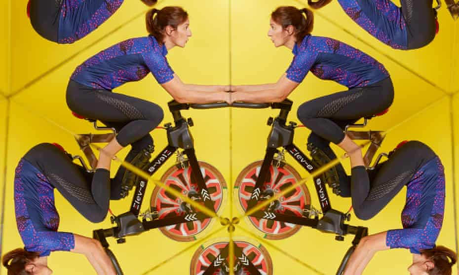Photograph of Zoe Williams on exercise bike reflected