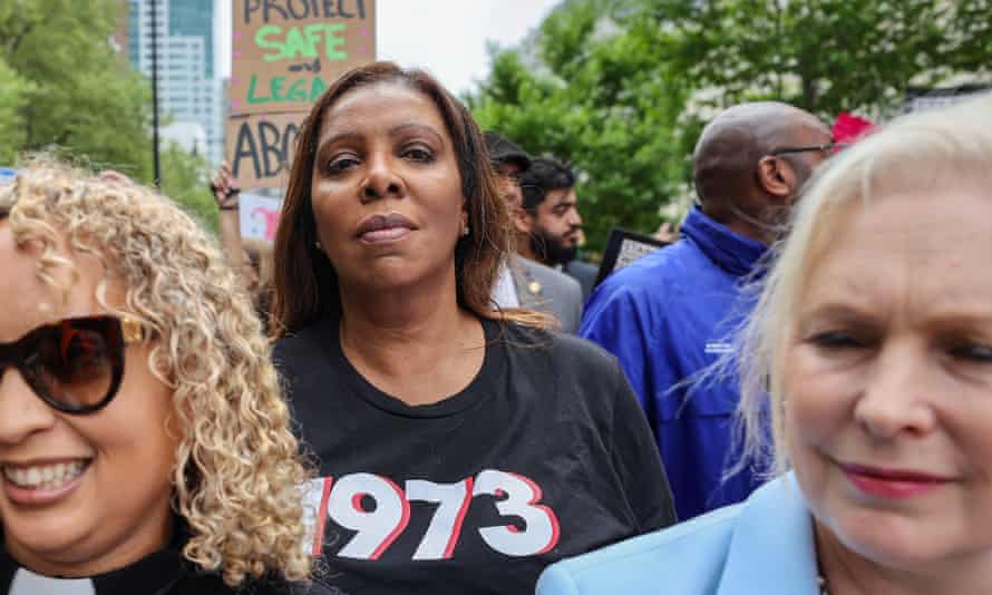 NY Attorney General Letitia James (Center, wearing 1973 tee shirt to signal support for the supreme court’s historic 1973 Roe v Wade ruling that legalized abortion in the US) marches in Brooklyn for reproductive choice. Front, right is US Senator Kirsten Gillibrand.
