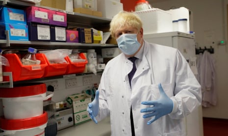 The prime minister, Boris Johnson, who announced the new measures, at the Jenner Institute in Oxford on Friday.
